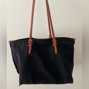 Black canvas bag with leather straps